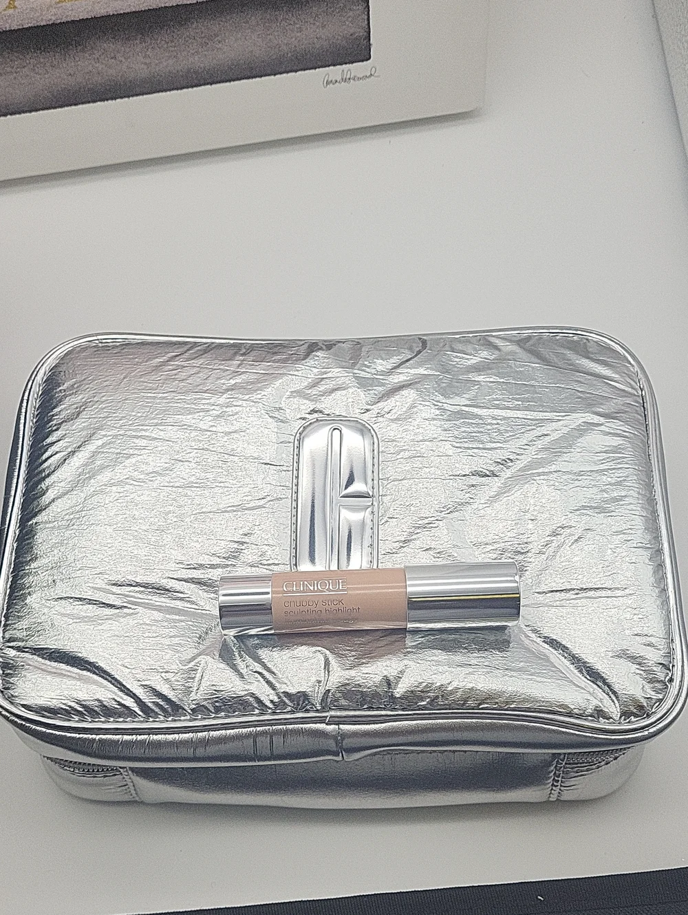 Clinique Silver Cosmetic Bag with Chubby Stick Sculpting Highlighter